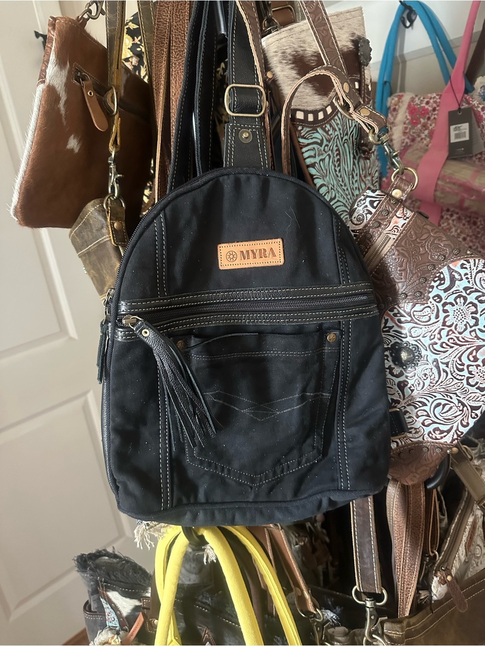 Myra Bag Black Canvas Mini Backpack with Tassel Zipper